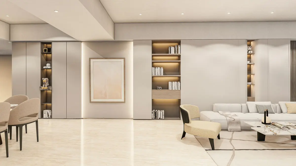 Living room with built-in display shelving, a pale sofa and marble flooring