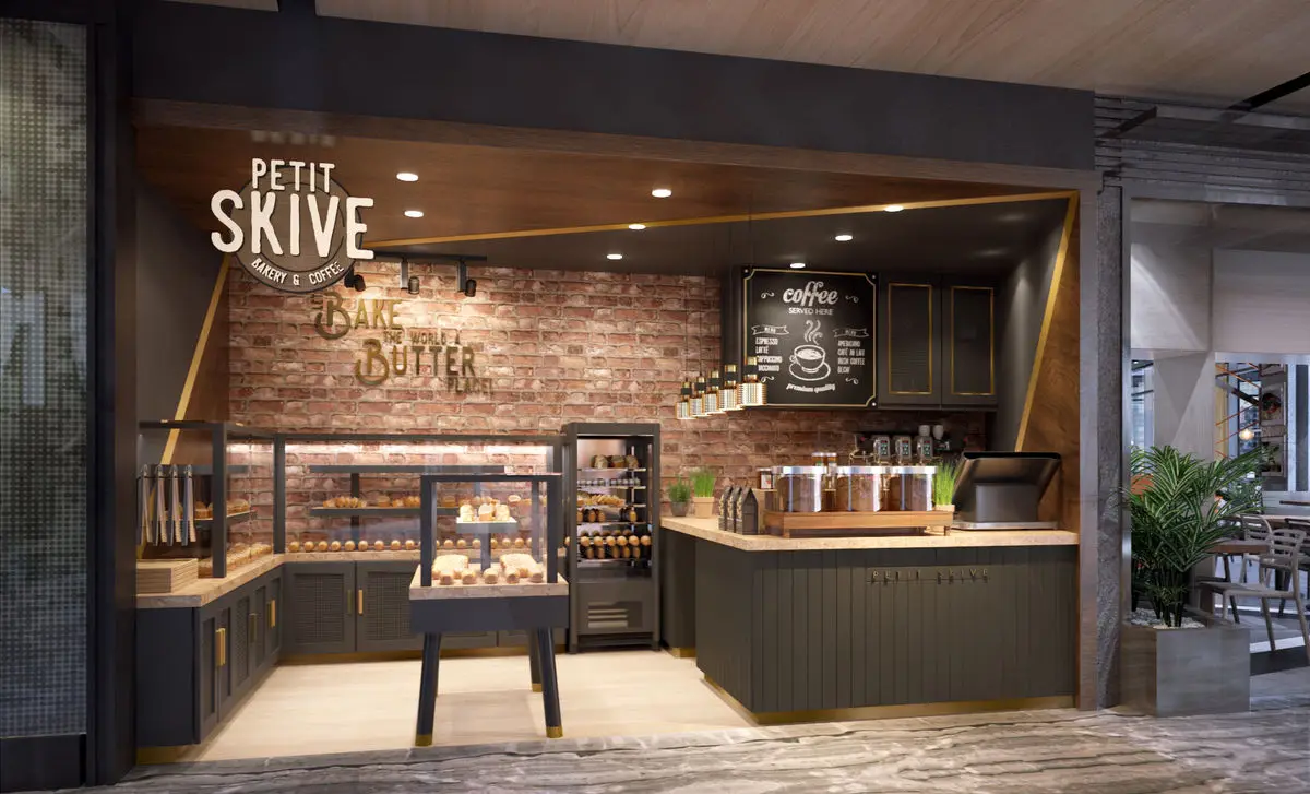Bakery counter with brick walls, timber ceiling and display cabinets