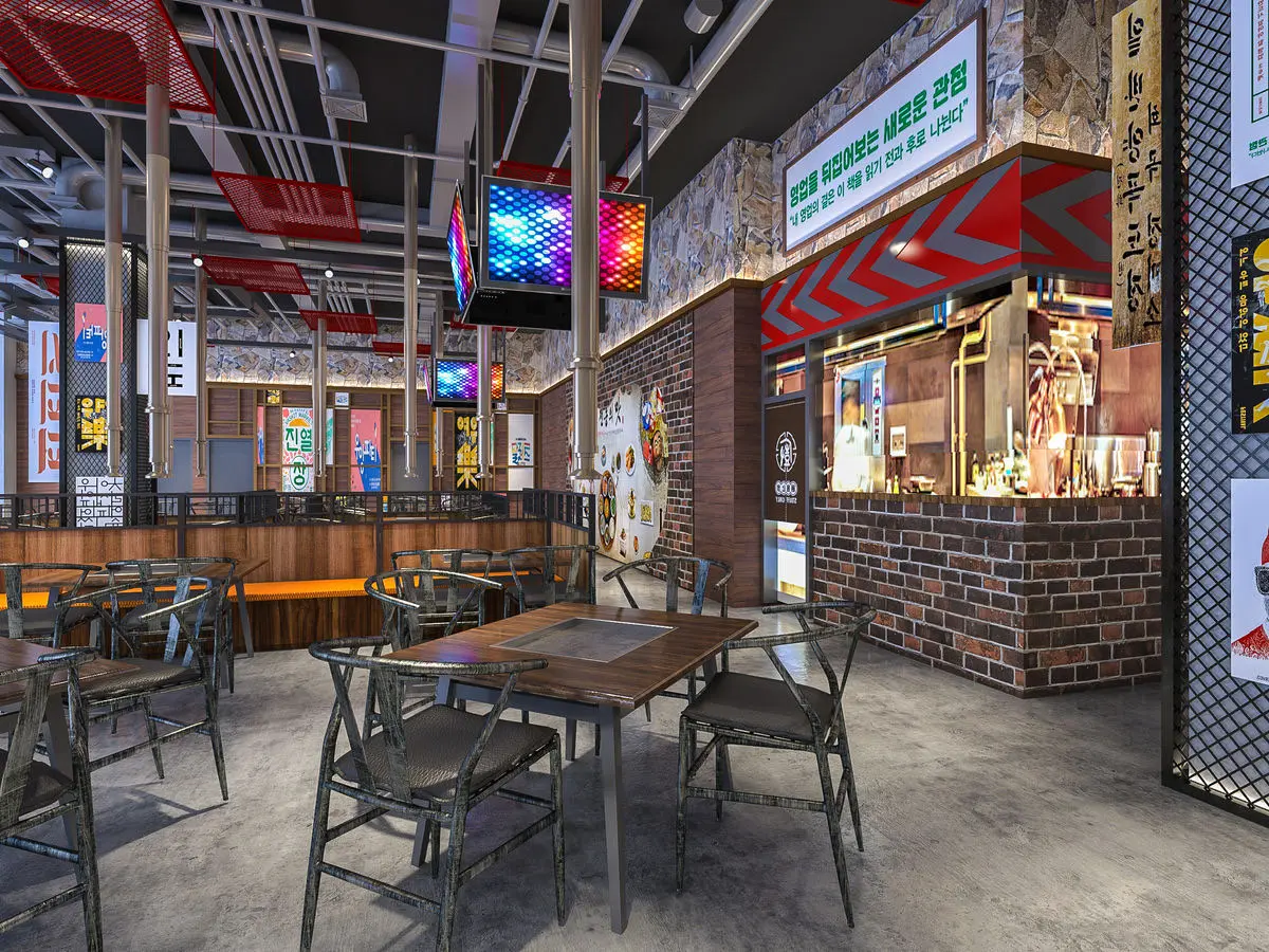 Korean BBQ restaurant with brick walls, neon signage and grill tables