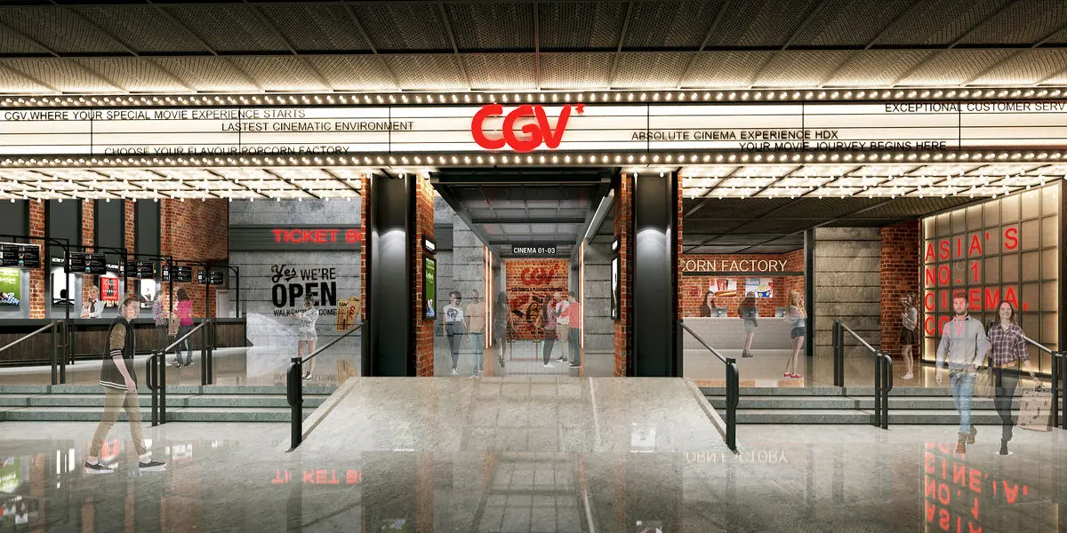 Cinema entrance with a marquee-style canopy and red brand signage