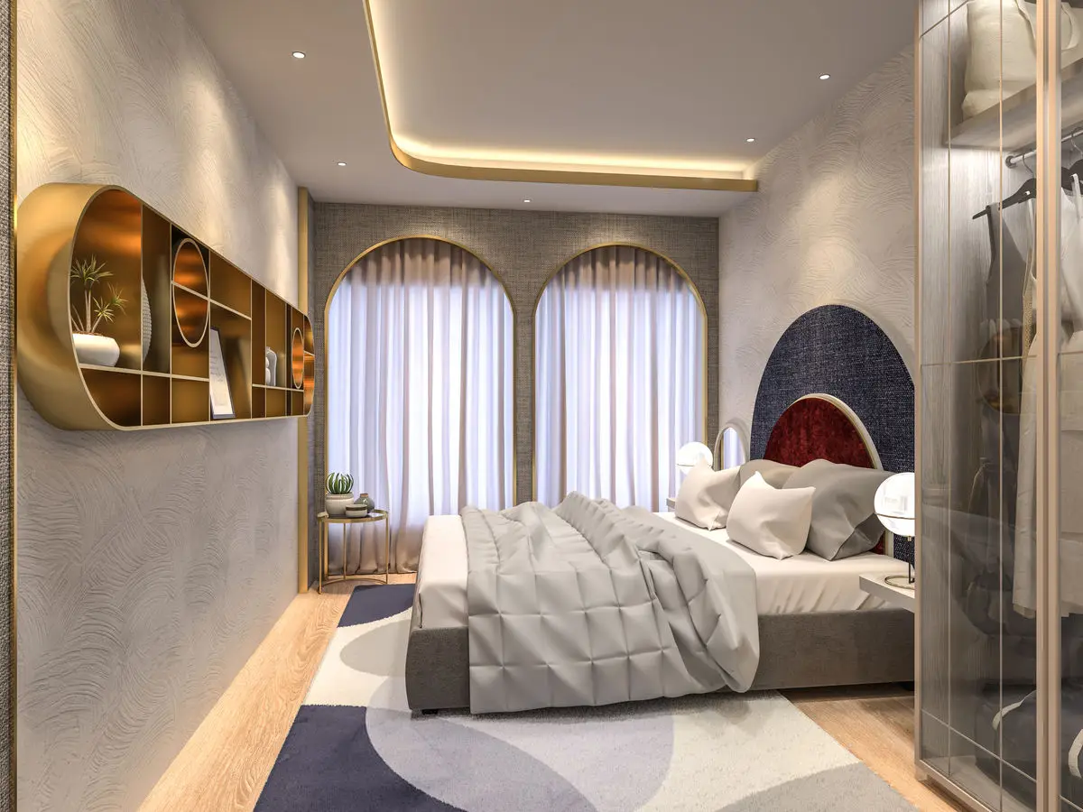 Bedroom with arched windows, a brass display shelf and a mirrored wardrobe