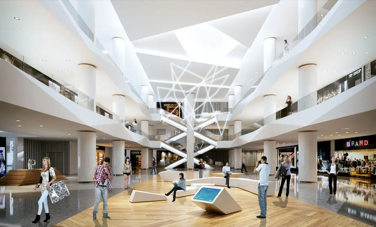 Mall interior with a skylit atrium, shopfronts and shoppers