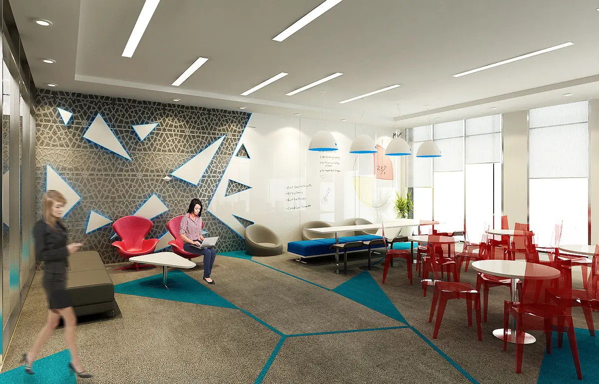 Breakout area with a patterned feature wall, soft seating and red café chairs