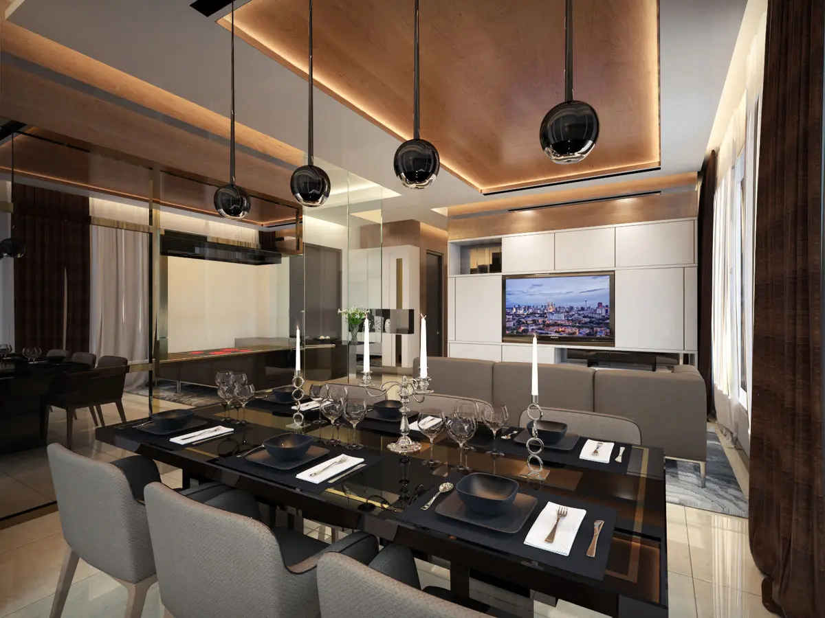 Dining room with a long dark table, pendant lights and a timber ceiling panel