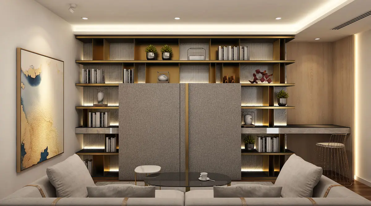 Living room with full-height shelving either side of an upholstered panel