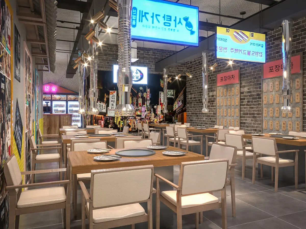 Dining area with neon signage, brick walls and BBQ tables