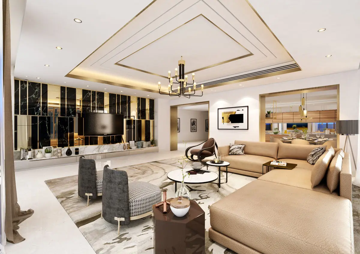 Living room with a layered ceiling, dark marble feature wall and pale modular sofas
