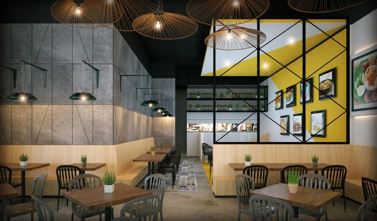 Dining room with concrete walls, pendant lights and yellow-framed artwork