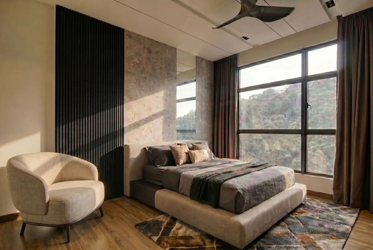 Bedroom with a fluted black wall panel, stone feature and a large window to the hillside