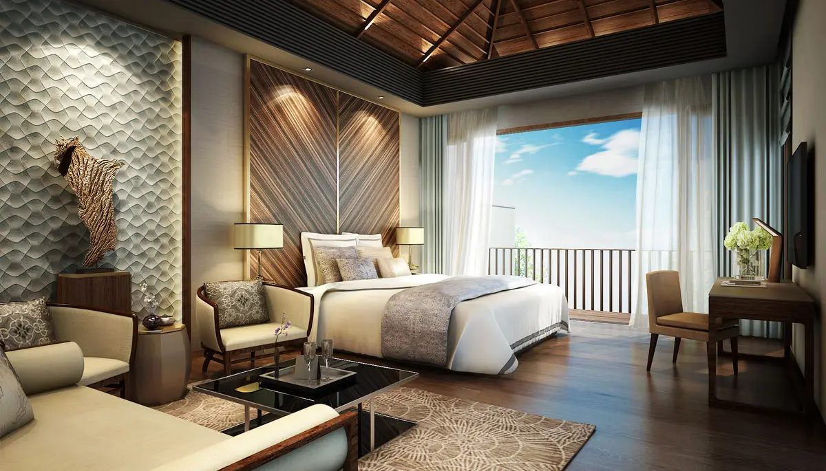 Bedroom with textured wall panels, a balcony beyond and a writing desk