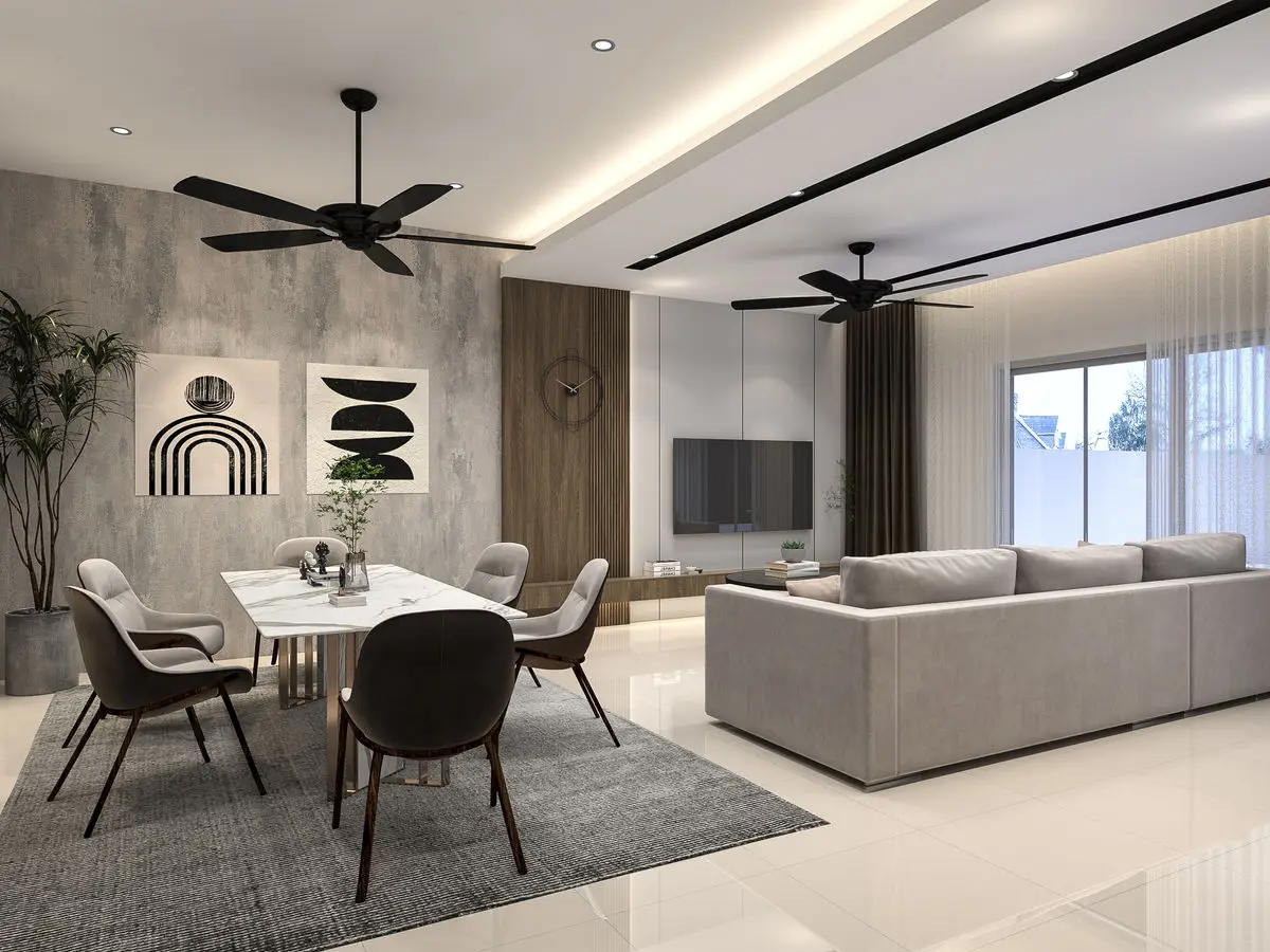 Open living and dining area with a concrete-look feature wall, ceiling fans and a grey sofa
