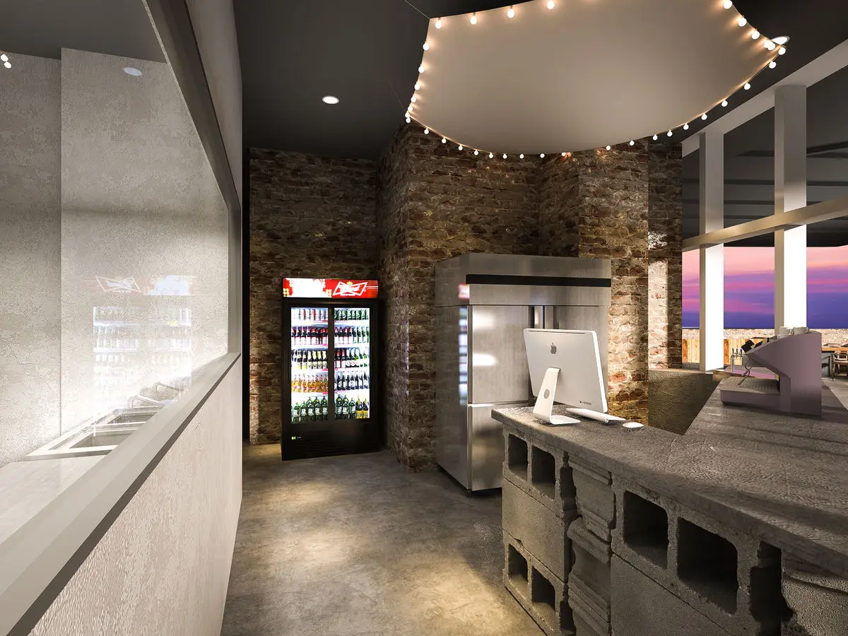 Counter area with drinks fridges, brick walls and festoon lighting
