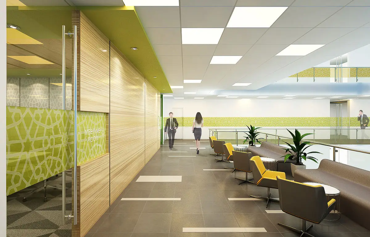 Office corridor with timber and green panelling, lounge seating and planters