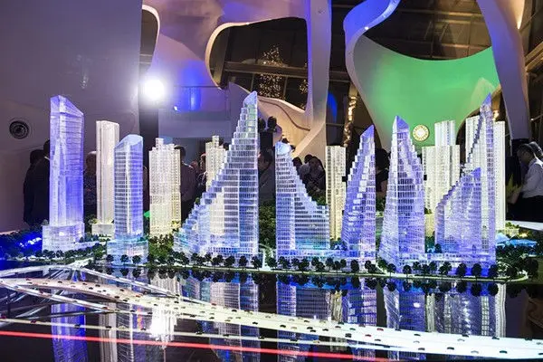 Illuminated architectural scale model of a high-rise development