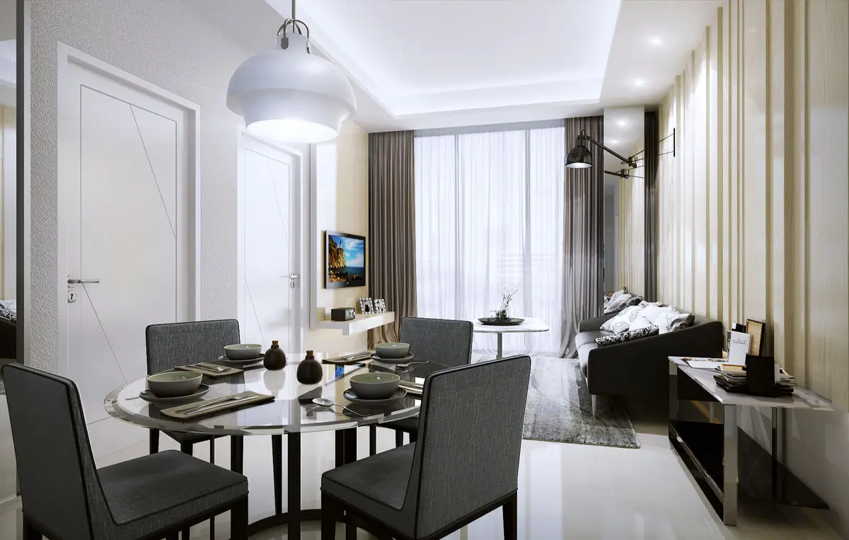 Dining area with a domed pendant light and living room beyond the curtained window