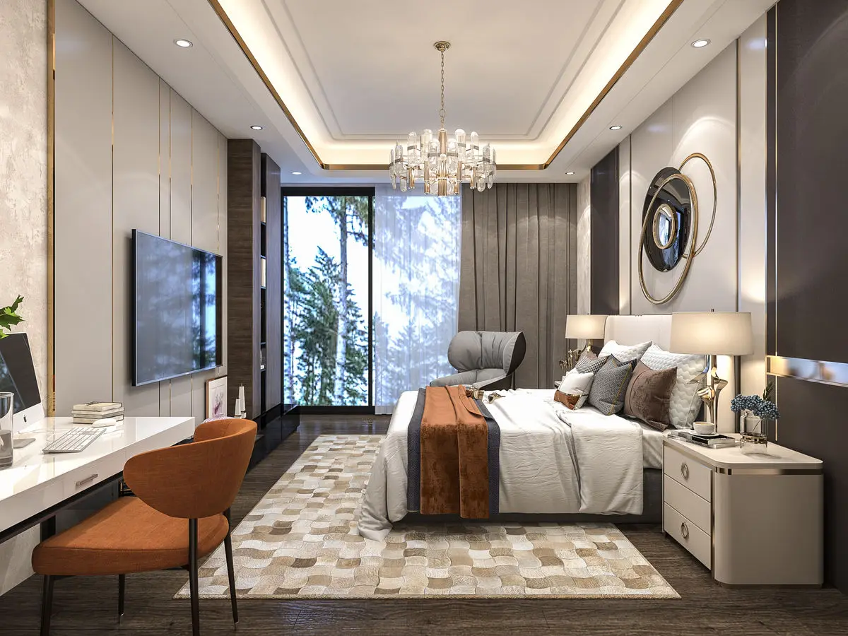 Bedroom with a chandelier, upholstered bed, desk with orange chair and a garden window