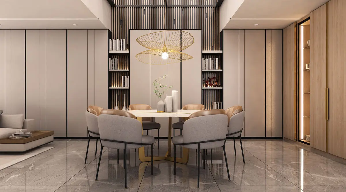 Dining area with a round table, rattan pendant light and full-height cabinetry