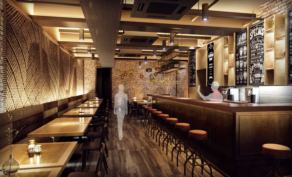 Long dining room with banquette seating, a bar counter and exposed brick