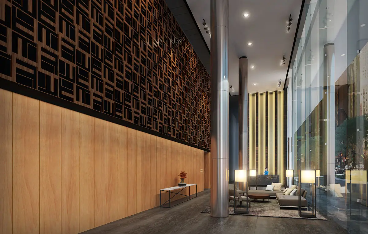 Lobby lounge with a perforated timber feature wall and seating