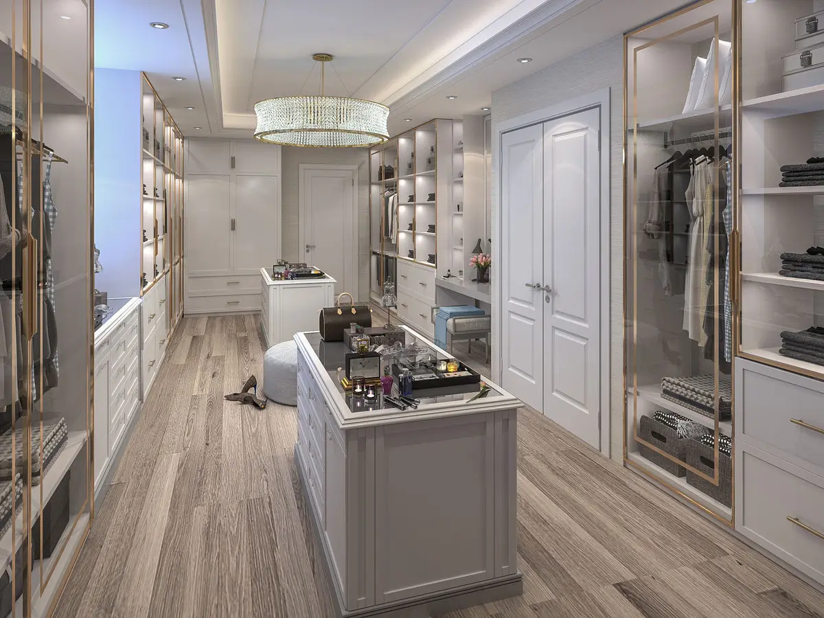Walk-in wardrobe with a central island, glass-fronted cabinets and open shelving