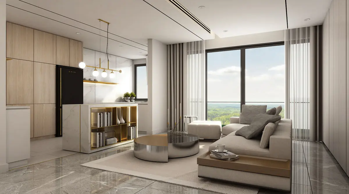 Living area with a kitchen counter behind, pendant lighting and a daybed by the window