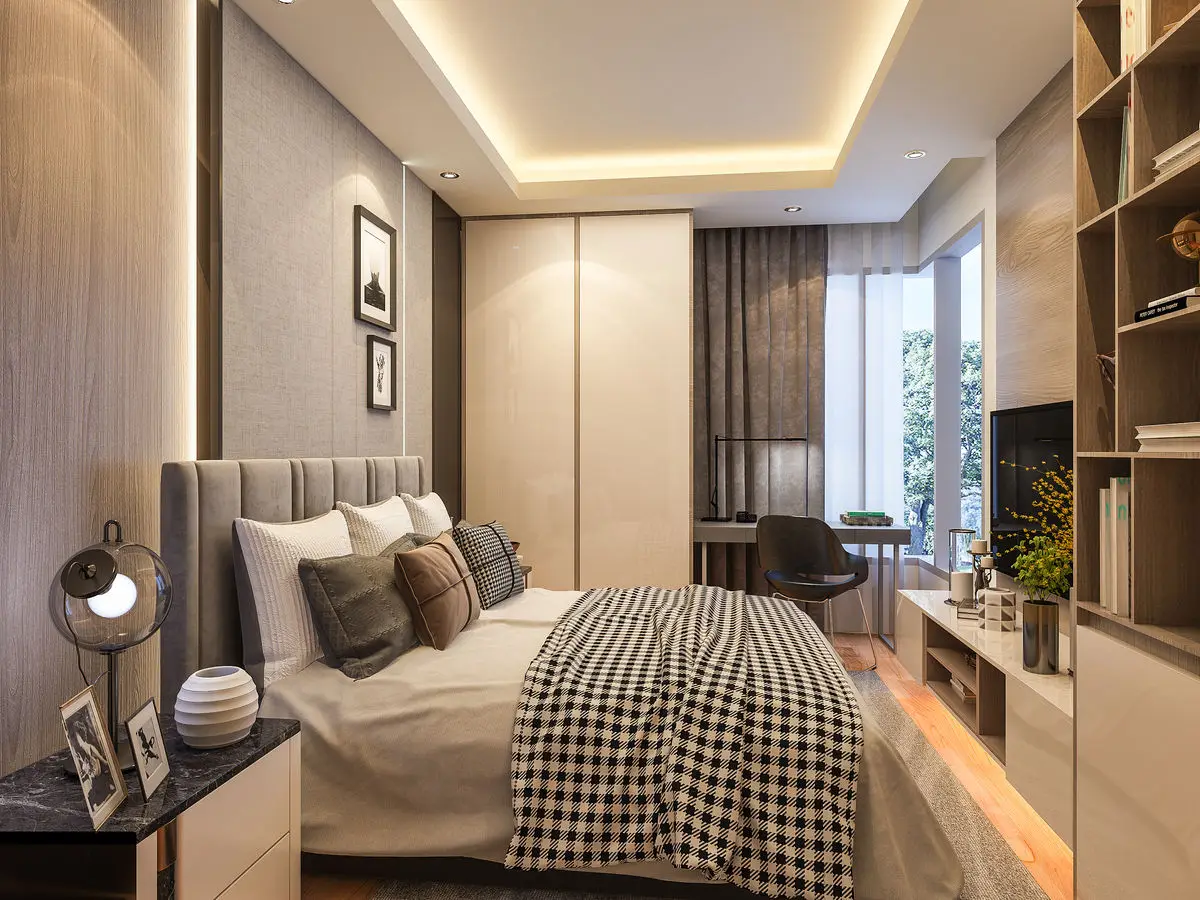 Bedroom with an upholstered headboard wall, checked bedding, built-in shelving and cove lighting