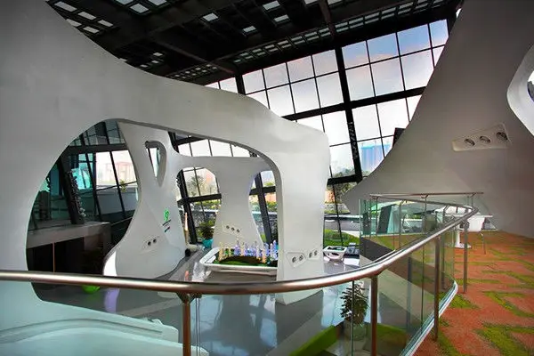 Mezzanine view over the atrium with sculptural white columns