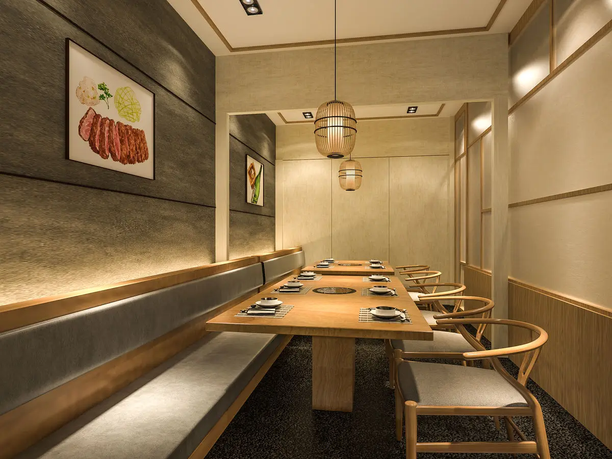 Private booth with banquette seating, a grill table and a lantern pendant