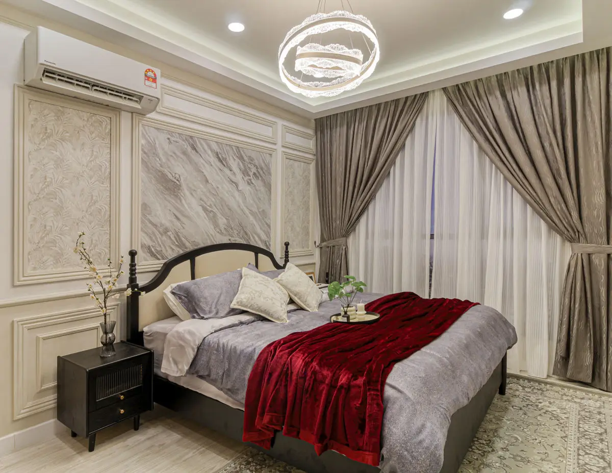 Bedroom with a four-poster style bed, panelled walls and a ring pendant light