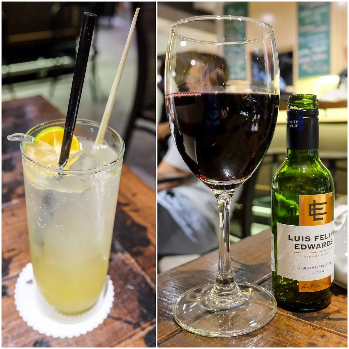 Drinks on a timber table — an iced beverage and a glass of red wine