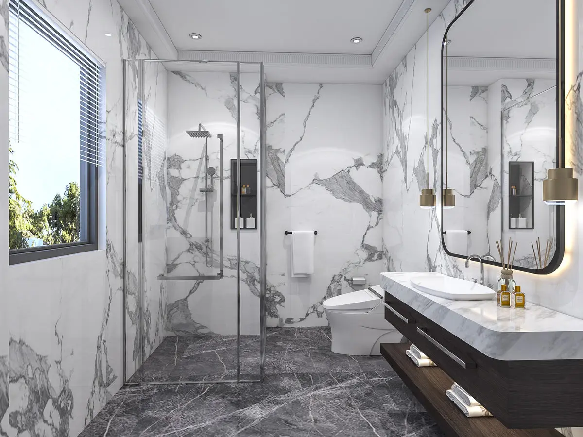 Bathroom with book-matched marble walls, walk-in shower and a wall-hung double vanity