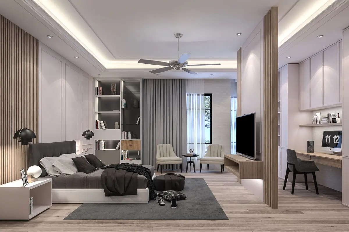 Bedroom with a fluted timber feature wall, wall-mounted TV and a study desk in the corner