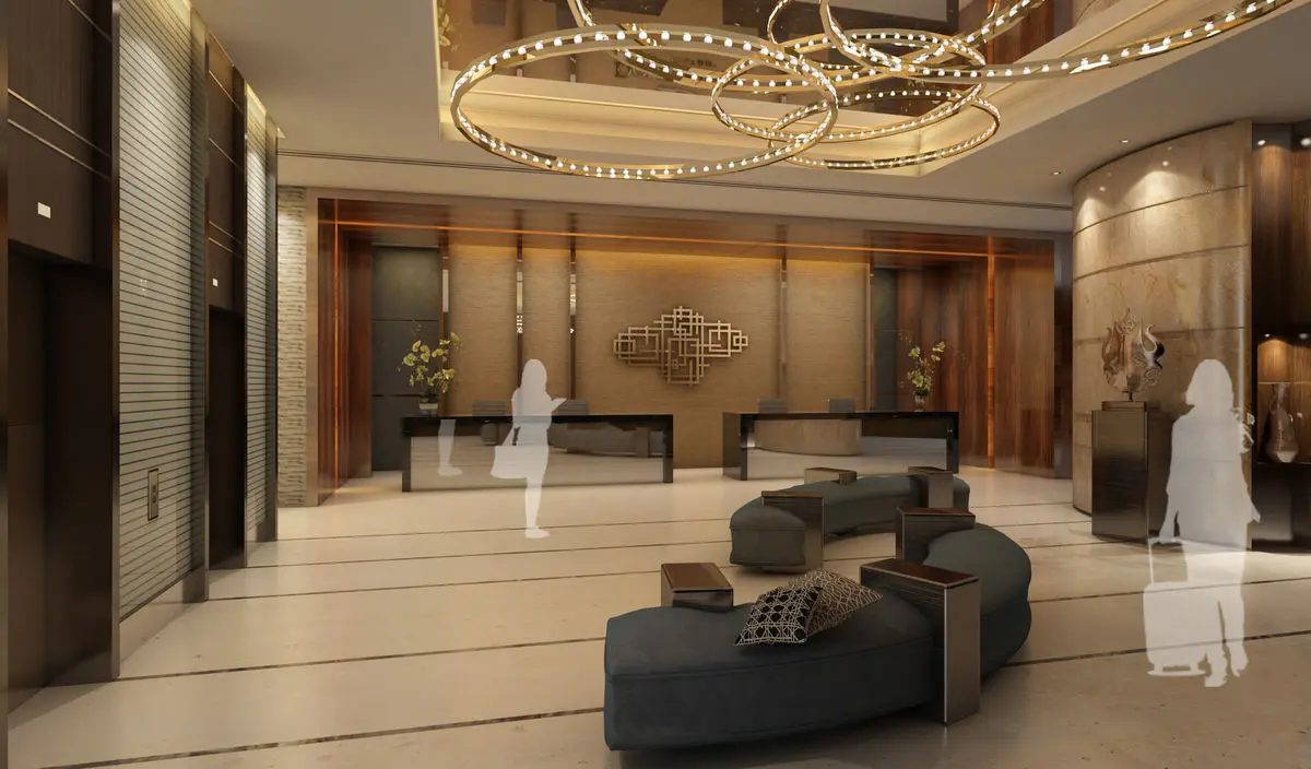 Hotel reception lobby with a ring chandelier and curved timber columns