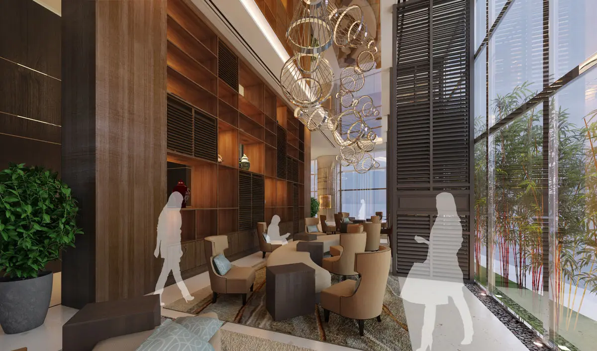 Lounge seating beside floor-to-ceiling glazing under a sculptural ring chandelier
